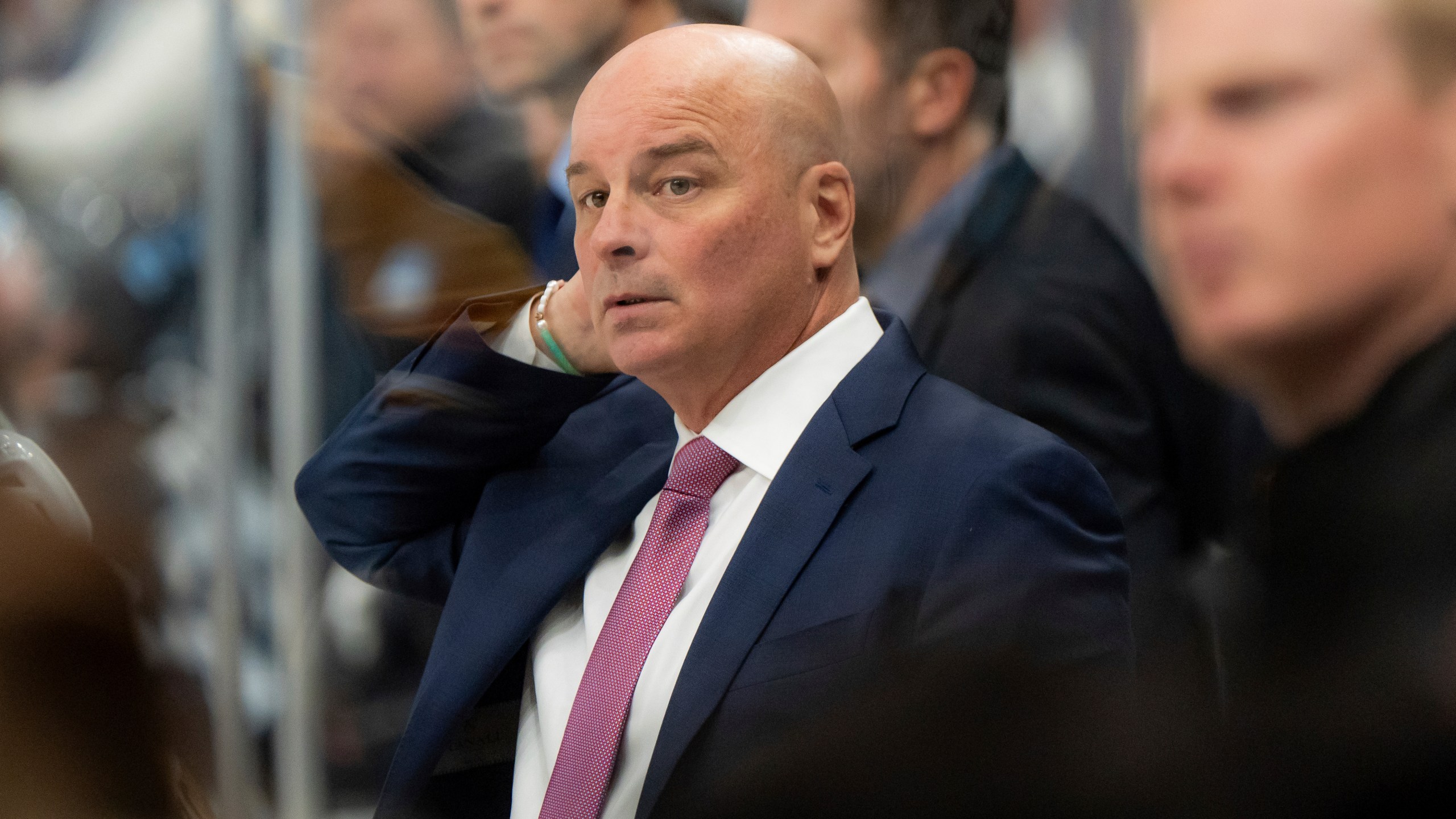 Boston Bruins head coach Jim Montgomery watches the action during the second period of an NHL hockey game against the Utah Hockey Club, Saturday, Oct. 19, 2024, in Salt Lake City. (AP Photo/Spenser Heaps)