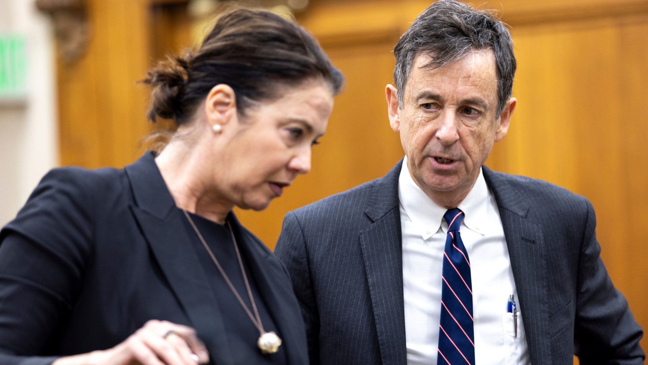 Prosecutor Sheila Ross and defense attorney John Donnelly confer during Jose Ibarra's trial at the Athens-Clarke County Superior Court, Tuesday, Nov. 19, 2024, in Athens, Ga. (Arvin Temkar/Atlanta Journal-Constitution via AP, Pool)