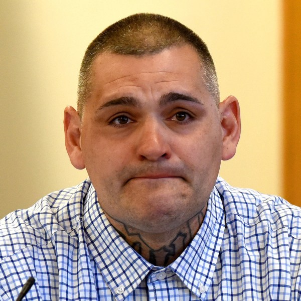 FILE - Michael Gilpatrick, a former youth detention center resident, fights back tears as testifies during a civil trial seeking to hold the state accountable for alleged abuse at the Sununu Youth Services Center, formerly called the Youth Development Center, April 17, 2024, at Rockingham County Superior Court in Brentwood, N.H. (David Lane/Union Leader via AP, Pool, File)