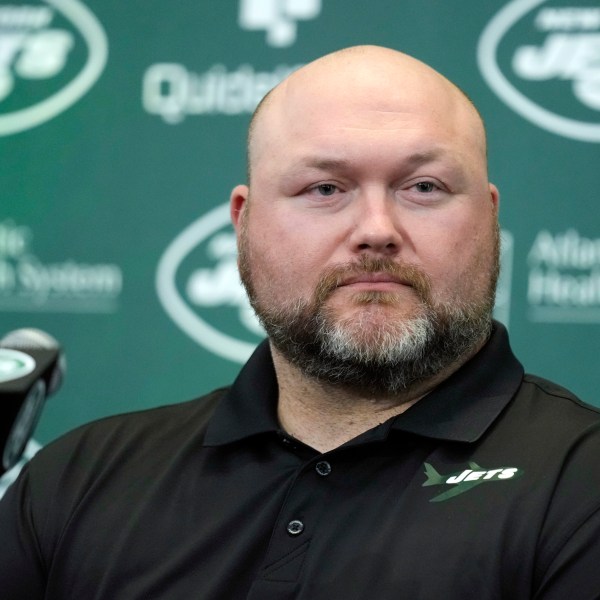 FILE - New York Jets general manager Joe Douglas listens during a news conference at the team's NFL football training facility in Florham Park, N.J., Wednesday, April 26, 2023. (AP Photo/Seth Wenig, File)