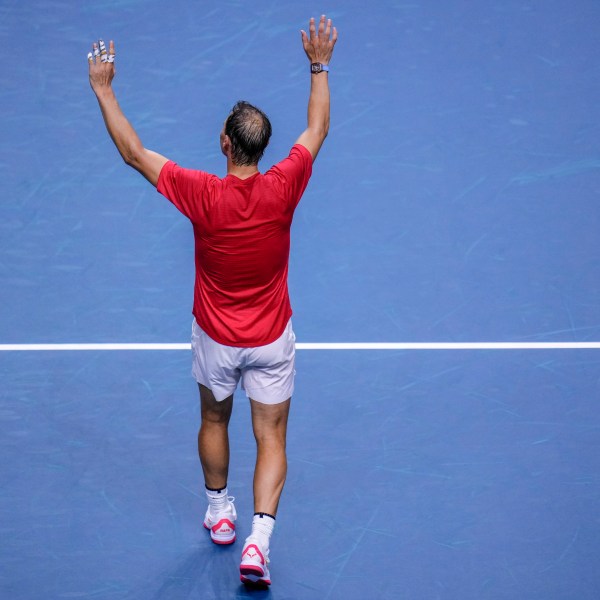 Spain's tennis player Rafael Nadal waves to the crowd after losing against Netherlands' Botic Van De Zandschulp during a Davis Cup quarterfinal match at Martin Carpena Sports Hall in Malaga, southern Spain, on Tuesday, Nov. 19, 2024. (AP Photo/Manu Fernandez)