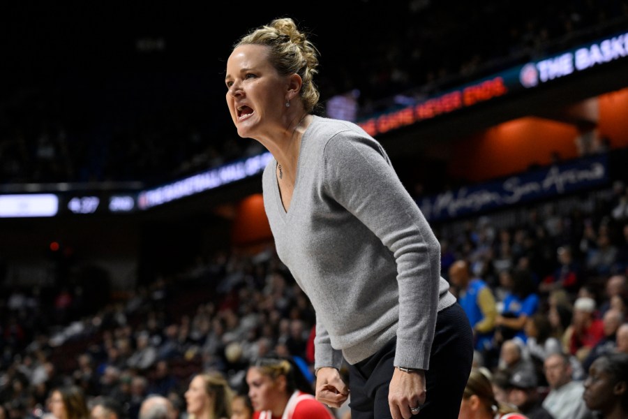 FILE - Utah head coach Lynne Roberts reacts in the first half of an NCAA college basketball game against South Carolina, Dec. 10, 2023, in Uncasville, Conn. (AP Photo/Jessica Hill, File)