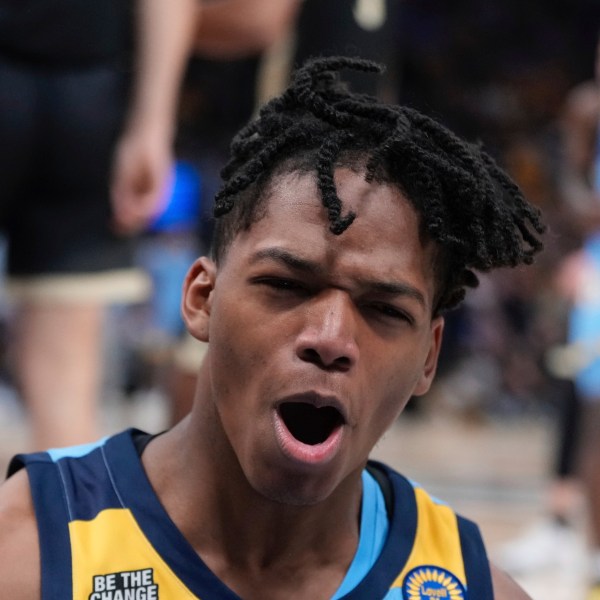 Marquette's Damarius Owens reacts after making a shot and being fouled during the first half of an NCAA college basketball game Tuesday, Nov. 19, 2024, in Milwaukee. (AP Photo/Morry Gash)