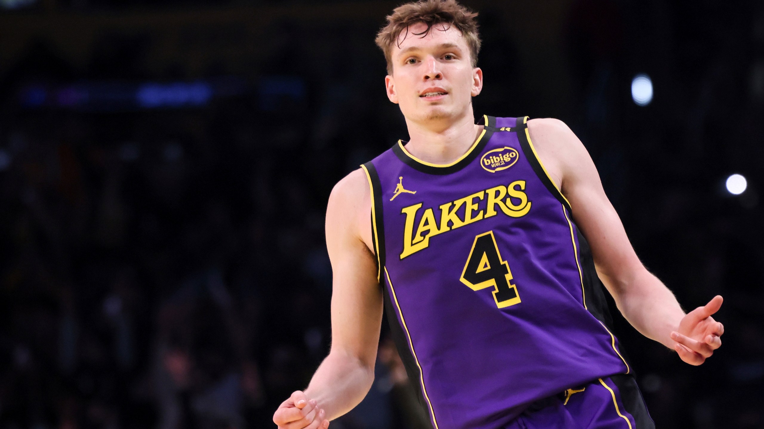 Los Angeles Lakers guard Dalton Knecht celebrates after scoring a 3-pointer during the second half of an Emirates NBA Cup basketball game against the Utah Jazz, Tuesday, Nov. 19, 2024, in Los Angeles. (AP Photo/Etienne Laurent)