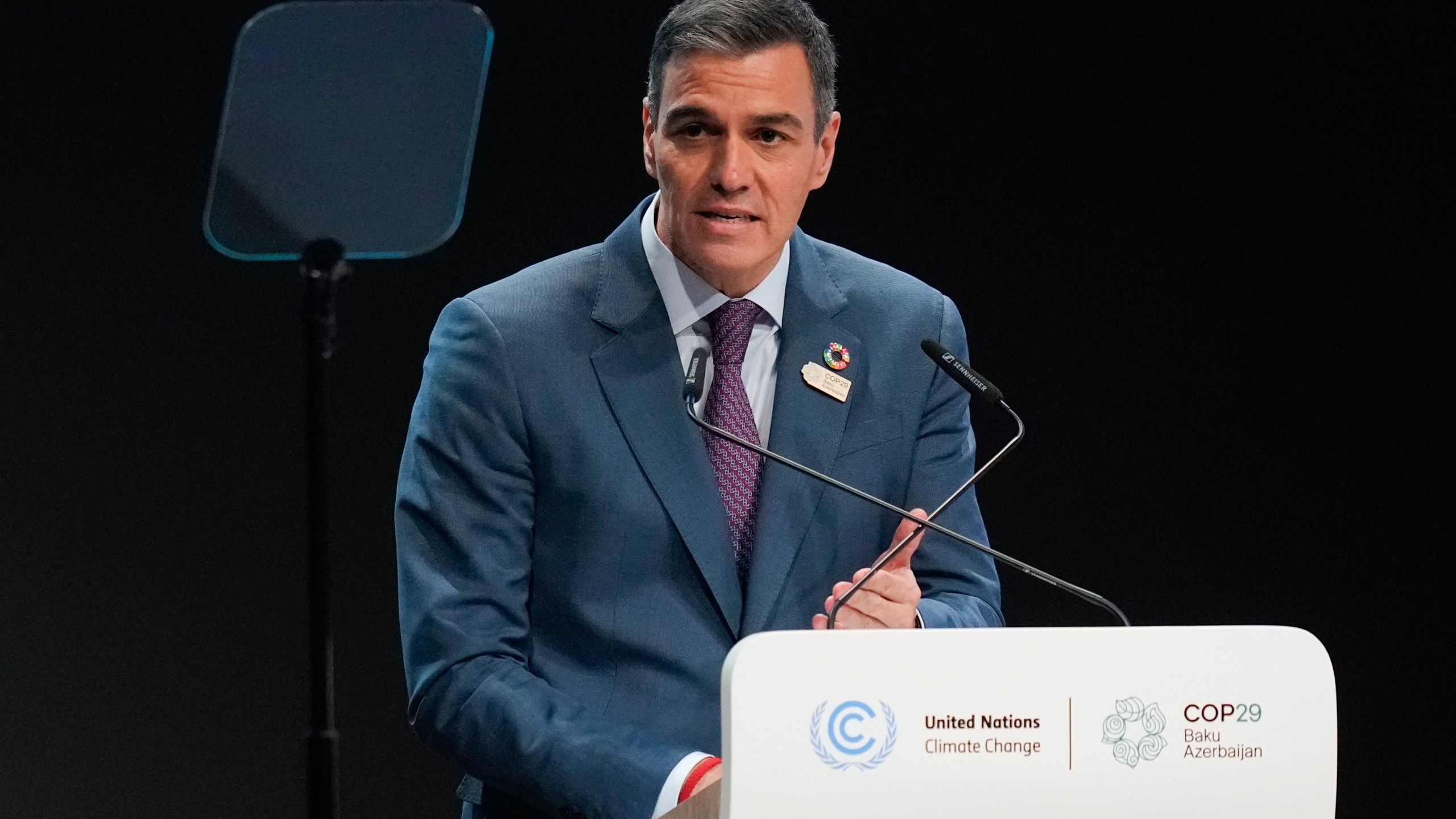 Spain President Pedro Sanchez speaks during a plenary session during a plenary session at the COP29 U.N. Climate Summit, Tuesday, Nov. 12, 2024, in Baku, Azerbaijan. (AP Photo/Rafiq Maqbool)