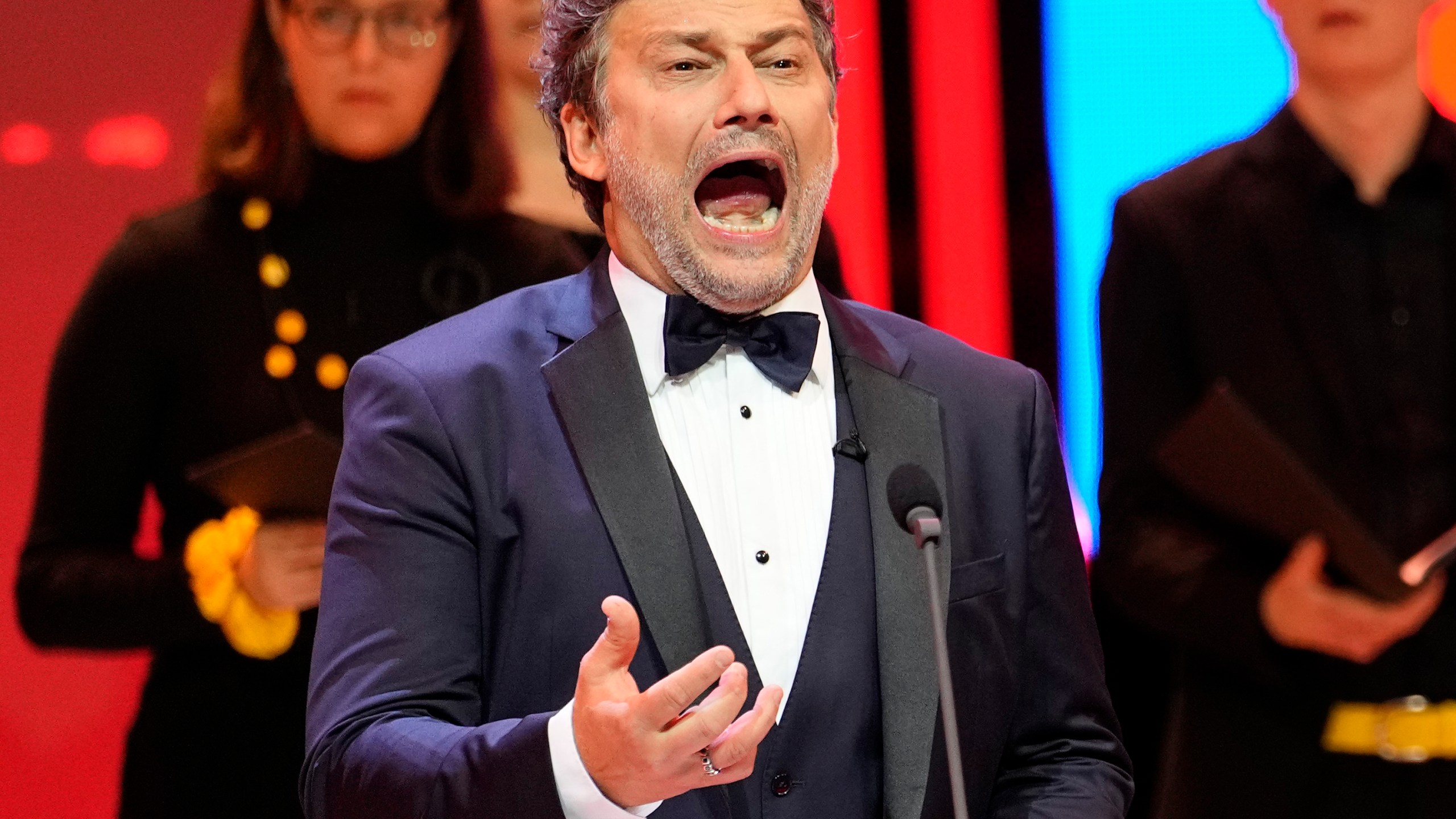 FILE - Tenor Jonas Kaufmann performs during the draw for the UEFA Euro 2024 soccer tournament finals in Hamburg, Germany on Dec. 2, 2023. Kaufmann has canceled his appearance in the production of Verdi's “La Forza del Destino” opening the season at Milan's Teatro alla Scala on Dec. 7. (AP Photo/Martin Meissner, File)