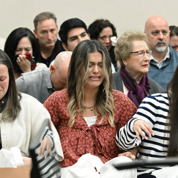 Family members and friends of Laken Riley react as Superior Court Judge H. Patrick Haggard announces the verdict during a trial of Jose Ibarra at Athens-Clarke County Superior Court, Wednesday, Nov. 20, 2024, in Athens, Ga. (Hyosub Shin/Atlanta Journal-Constitution via AP, Pool)