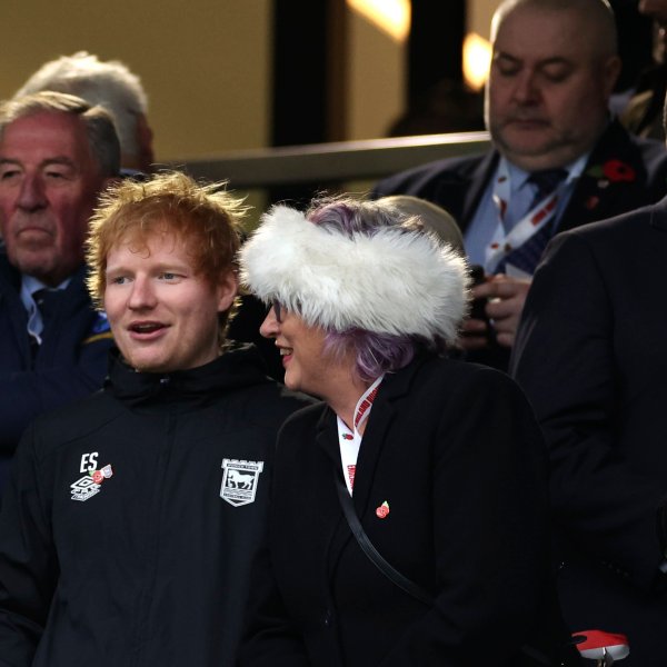 English singer-songwrite Ed Sheeran, left, watches the Autumn Nations series rugby union match between England and Australia, at Twickenham stadium, London Saturday, Nov. 9, 2024. (AP Photo/Ian Walton)