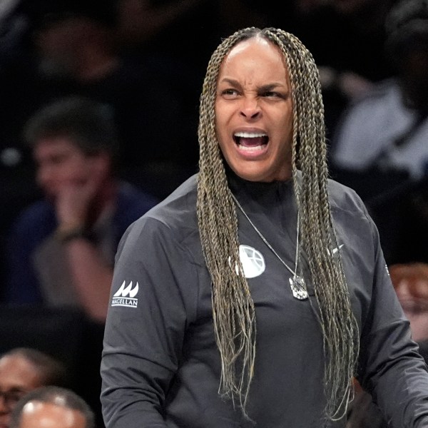 FILE - Chicago Sky coach Teresa Weatherspoon calls out to players during the first half of the team's WNBA basketball game against the New York Liberty, May 23, 2024, in New York. (AP Photo/Frank Franklin II, File)