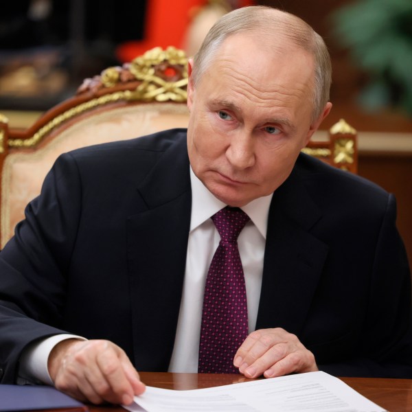 Russian President Vladimir Putin meets with First Deputy Prime Minister Denis Manturov at the Kremlin, in Moscow, Russia, Wednesday, Nov. 20, 2024. (Vyacheslav Prokofyev, Sputnik, Kremlin Pool Photo via AP)