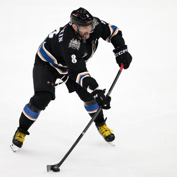 Washington Capitals left wing Alex Ovechkin (8) skates with the puck during the third period of an NHL hockey game against the Nashville Predators, Wednesday, Nov. 6, 2024, in Washington. The Capitals won 3-2. (AP Photo/Nick Wass)