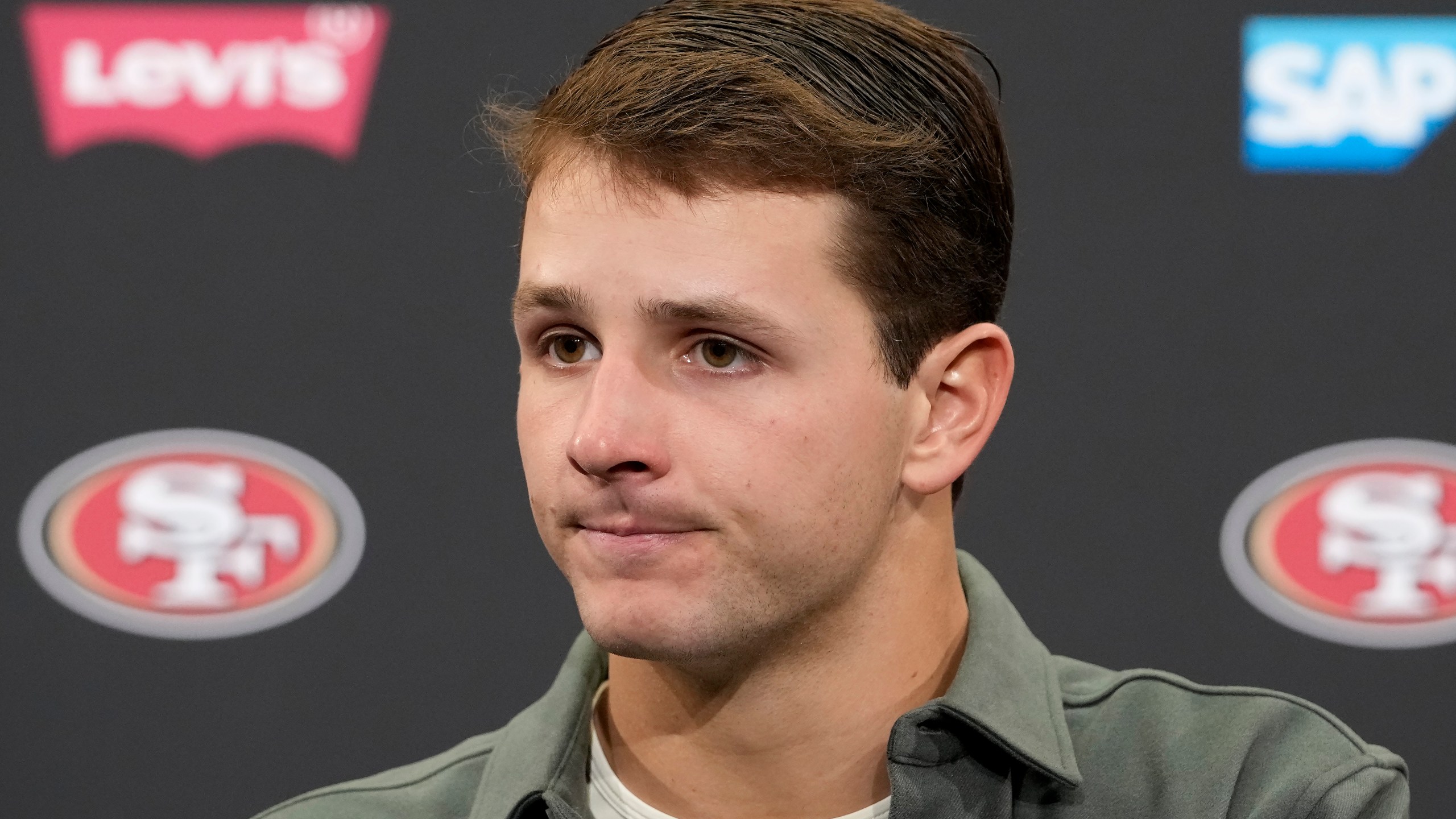 San Francisco 49ers quarterback Brock Purdy speaks at a news conference after an NFL football game against the Seattle Seahawks in Santa Clara, Calif., Sunday, Nov. 17, 2024. (AP Photo/Godofredo A. Vásquez)