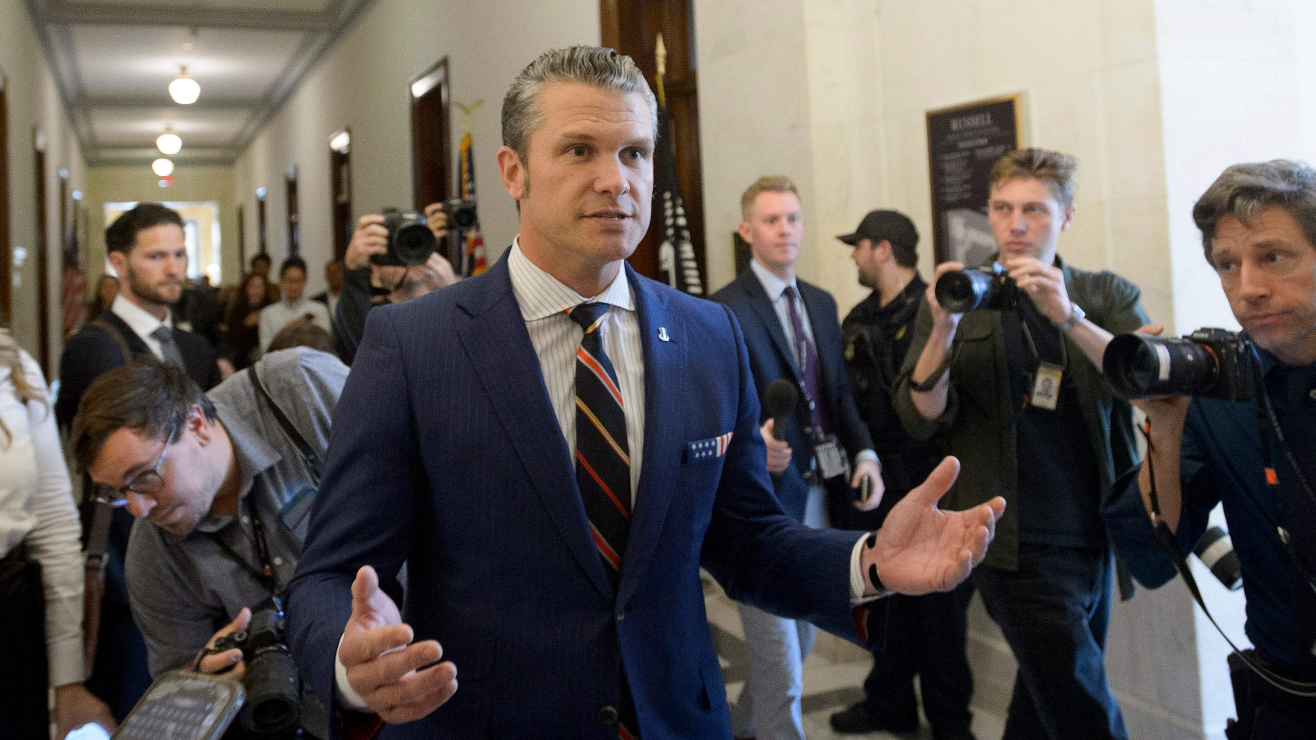 Pete Hegseth, President-elect Donald Trump's pick for secretary of defense, speaks with reporters following a meeting with senators on Capitol Hill, Thursday, Nov. 21, 2024, in Washington. (AP Photo/Rod Lamkey, Jr.)