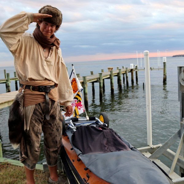 Peter Frank stands by his canoe in Annapolis, Md., on Thursday, Nov. 7, 2024, a day before he plans to resume his trip along the Great Loop in what is roughly a 6,000-mile voyage and that he estimates will take him a total of about 17 months. (AP Photo/Brian Witte)