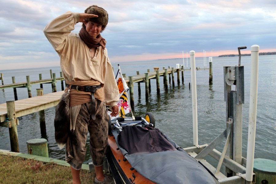 Peter Frank stands by his canoe in Annapolis, Md., on Thursday, Nov. 7, 2024, a day before he plans to resume his trip along the Great Loop in what is roughly a 6,000-mile voyage and that he estimates will take him a total of about 17 months. (AP Photo/Brian Witte)