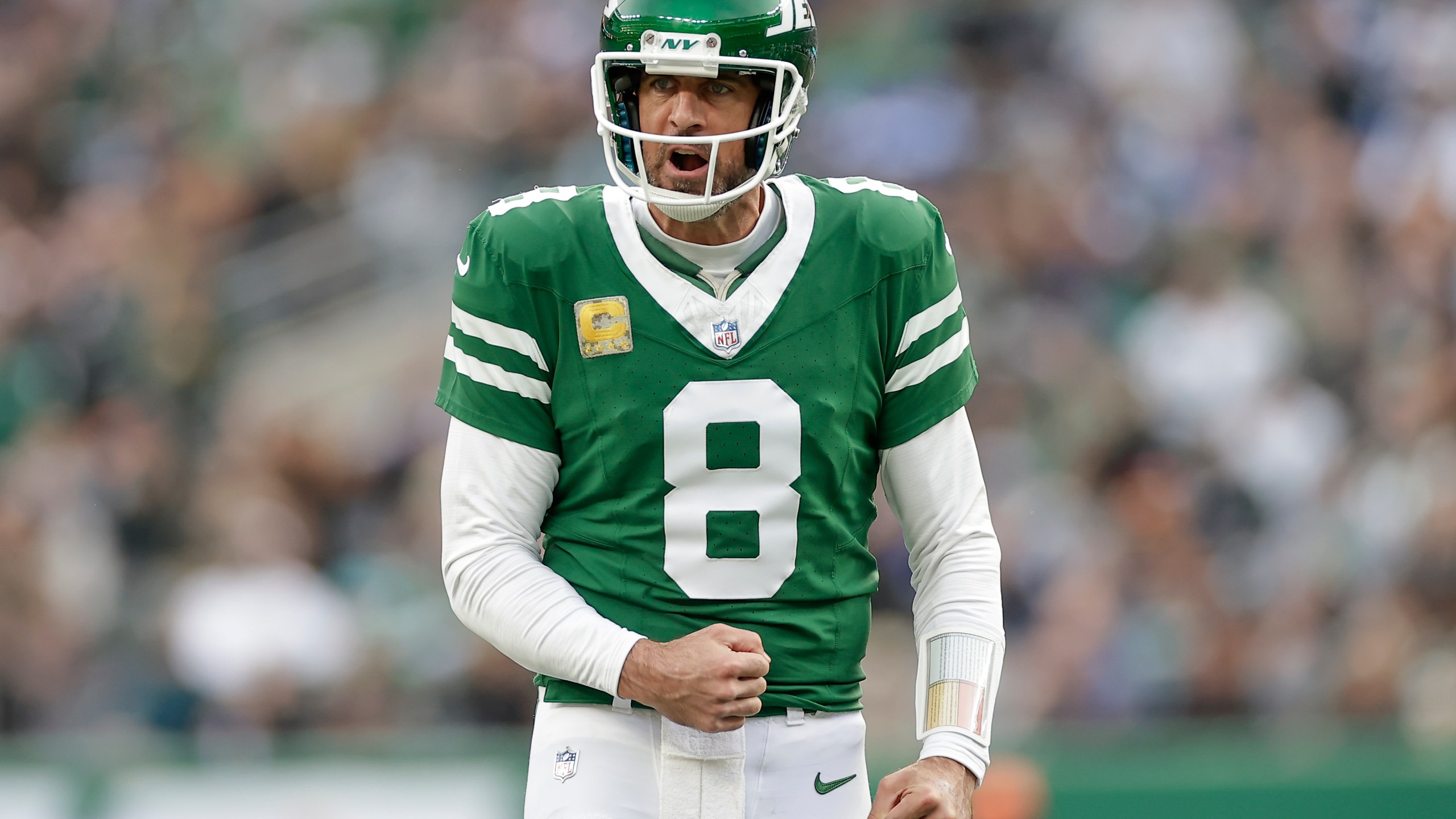 New York Jets quarterback Aaron Rodgers (8) reacts during the fourth quarter of an NFL football game against the Indianapolis Colts, Sunday, Nov. 17, 2024, in East Rutherford, N.J. (AP Photo/Adam Hunger)