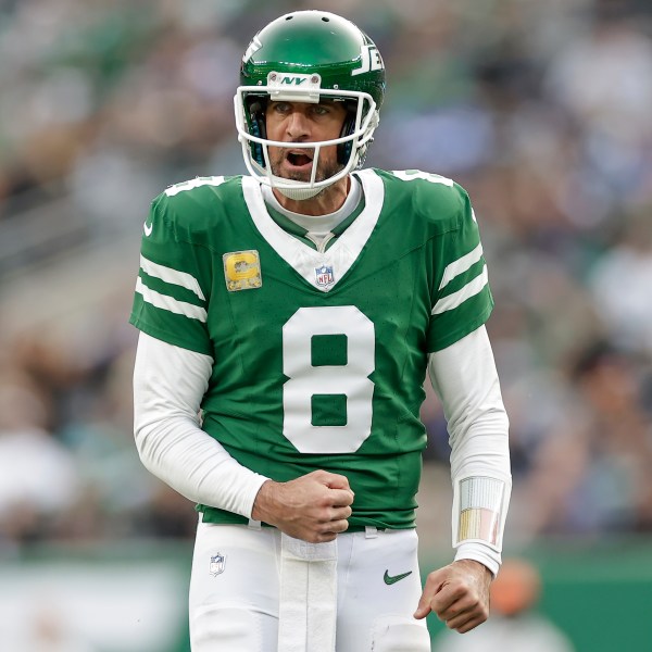 New York Jets quarterback Aaron Rodgers (8) reacts during the fourth quarter of an NFL football game against the Indianapolis Colts, Sunday, Nov. 17, 2024, in East Rutherford, N.J. (AP Photo/Adam Hunger)