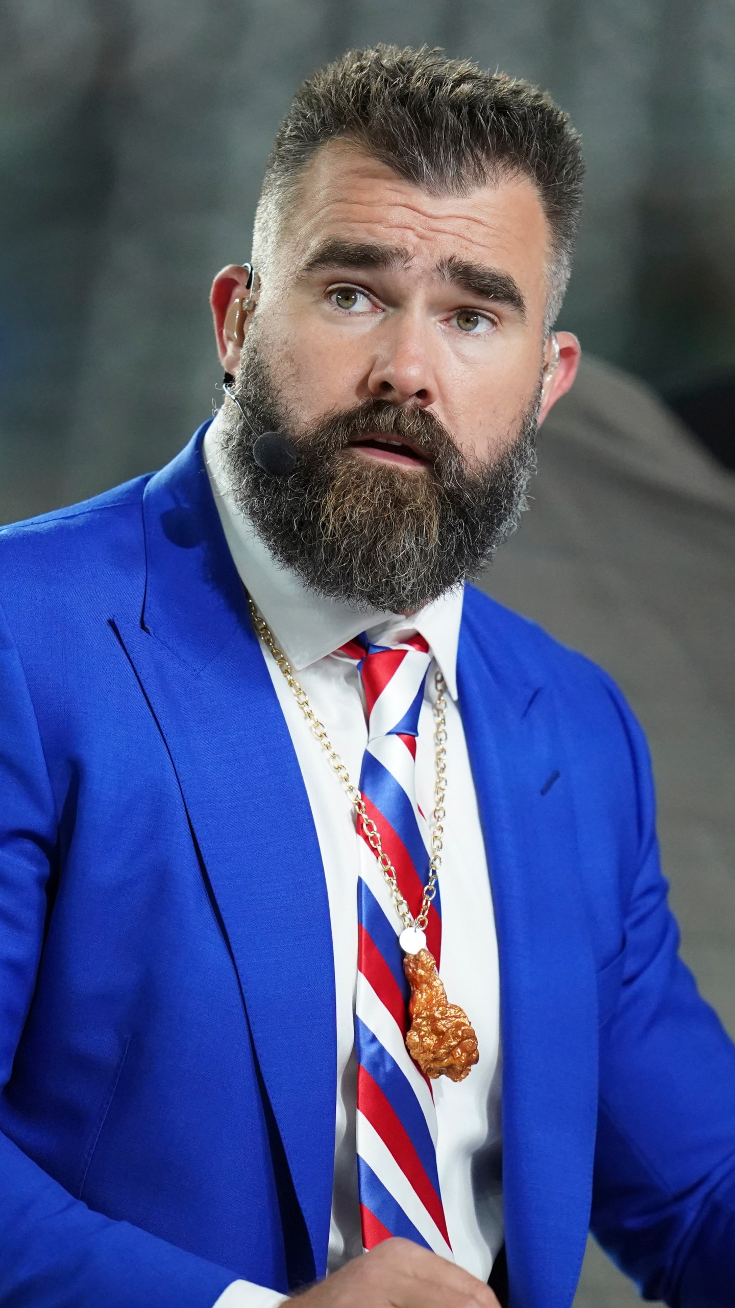 FILE - Former Philadelphia Eagles center Jason Kelce prepares for his ESPN debut as a Monday Night Football Analyst before an NFL football game between the Buffalo Bill and the New York Jets, Oct. 14, 2024 in East Rutherford, N.J. (AP Photo/Vera Nieuwenhuis, File)