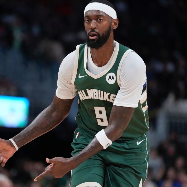 Milwaukee Bucks' Bobby Portis reacts to his three pointer during the first half of an NBA basketball game Wednesday, Nov. 20, 2024, in Milwaukee. (AP Photo/Morry Gash)