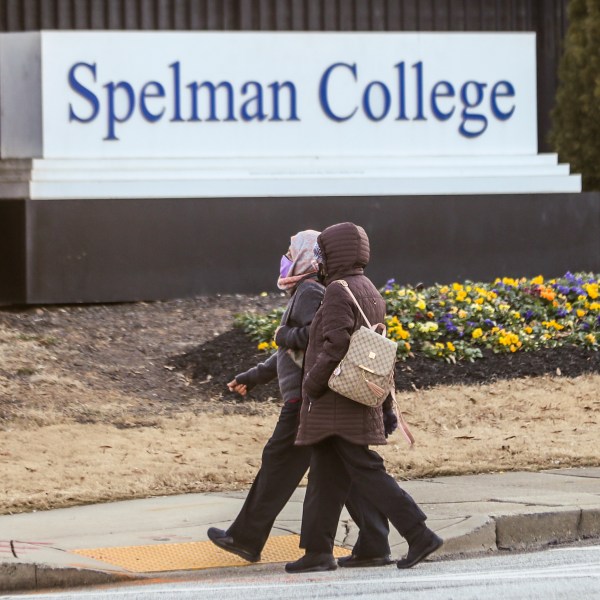 FILE - People walk outside the Spelman campus, Feb. 1, 2022, in Atlanta. (John Spink/Atlanta Journal-Constitution via AP, File)