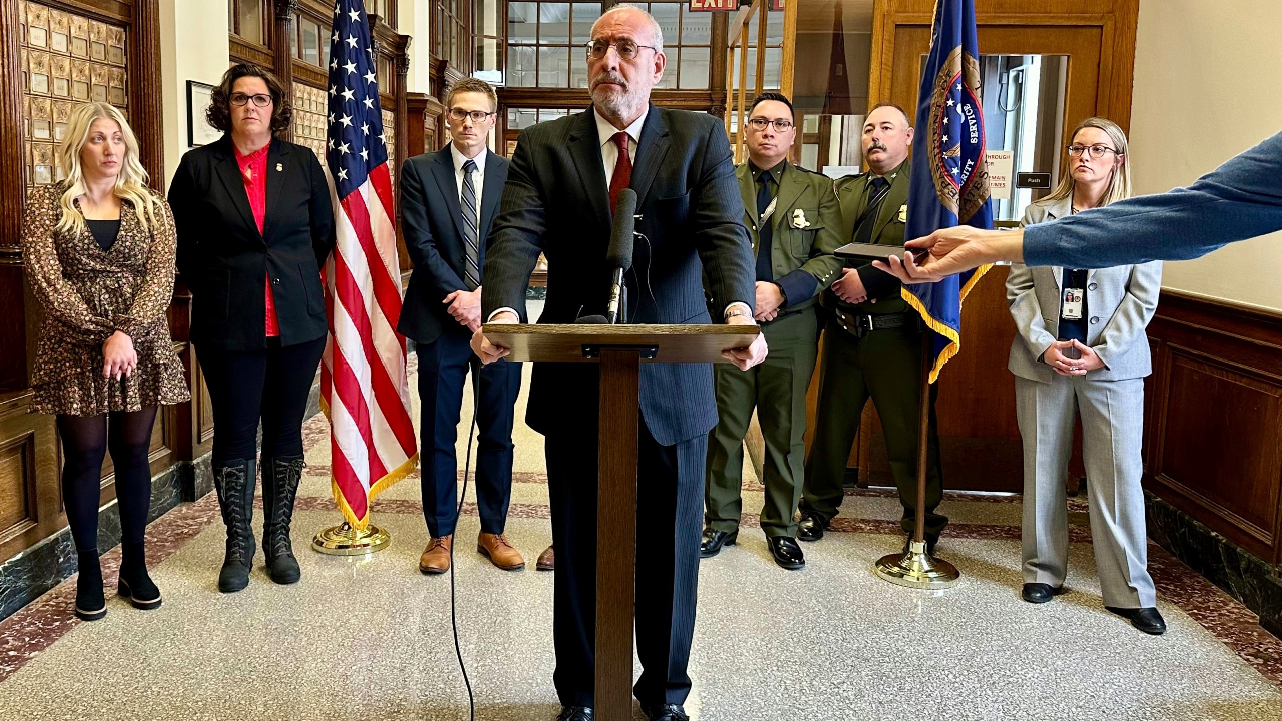 Minnesota U.S. Attorney Andy Luger addresses reporters on Friday, Nov. 22, 2024, at the federal courthouse in Fergus Falls, Minn., after two men were found guilty of human smuggling charges in connection with a case that led to the deaths of a family of four from India, who tried to cross the Canada-U.S. border during a blizzard in 2022. (AP Photo/Mark Vancleave)