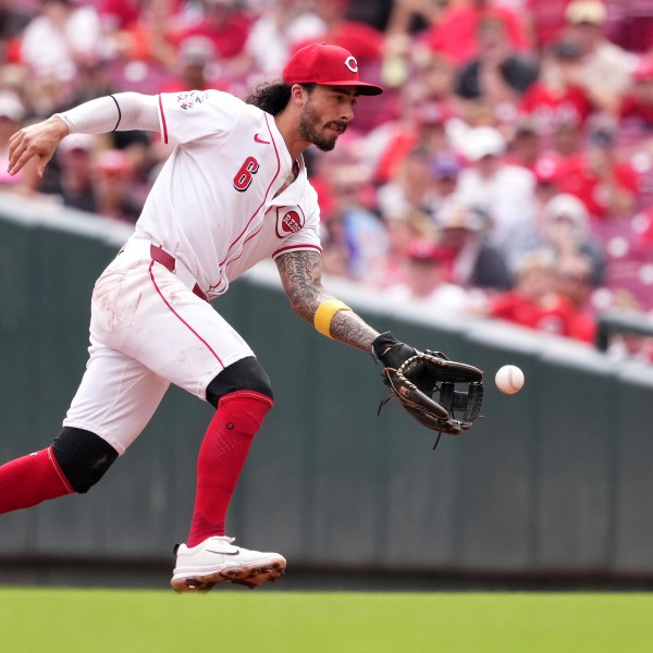 FILE - Cincinnati Reds' Jonathan India fields a ground ball hit by Pittsburgh Pirates' Oneil Cruz during the fifth inning of a baseball game, Sept. 22, 2024, in Cincinnati. (AP Photo/Kareem Elgazzar, File)