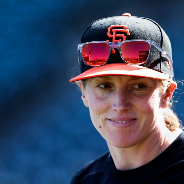 FILE - San Francisco Giants assistant baseball coach Alyssa Nakken speaks to a reporter in San Francisco, July 7, 2023. (AP Photo/Josie Lepe, File)