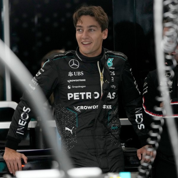 Mercedes driver George Russell, of Britain, waits in the garage area prior to a practice session for the Formula One U.S. Grand Prix auto race, Thursday, Nov. 21, 2024, in Las Vegas. (AP Photo/Matt York)