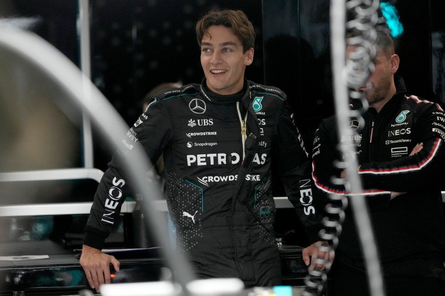 Mercedes driver George Russell, of Britain, waits in the garage area prior to a practice session for the Formula One U.S. Grand Prix auto race, Thursday, Nov. 21, 2024, in Las Vegas. (AP Photo/Matt York)