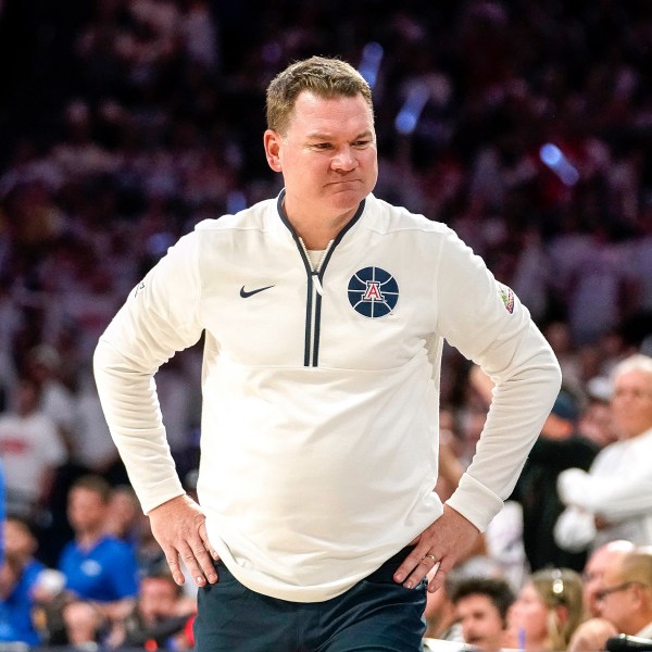 Arizona Wildcats coach Tommy Lloyd reacts to a call against his team during the second half of an NCAA college basketball game against Duke Friday, Nov. 22, 2024, in Tucson, Ariz. (AP Photo/Darryl Webb)