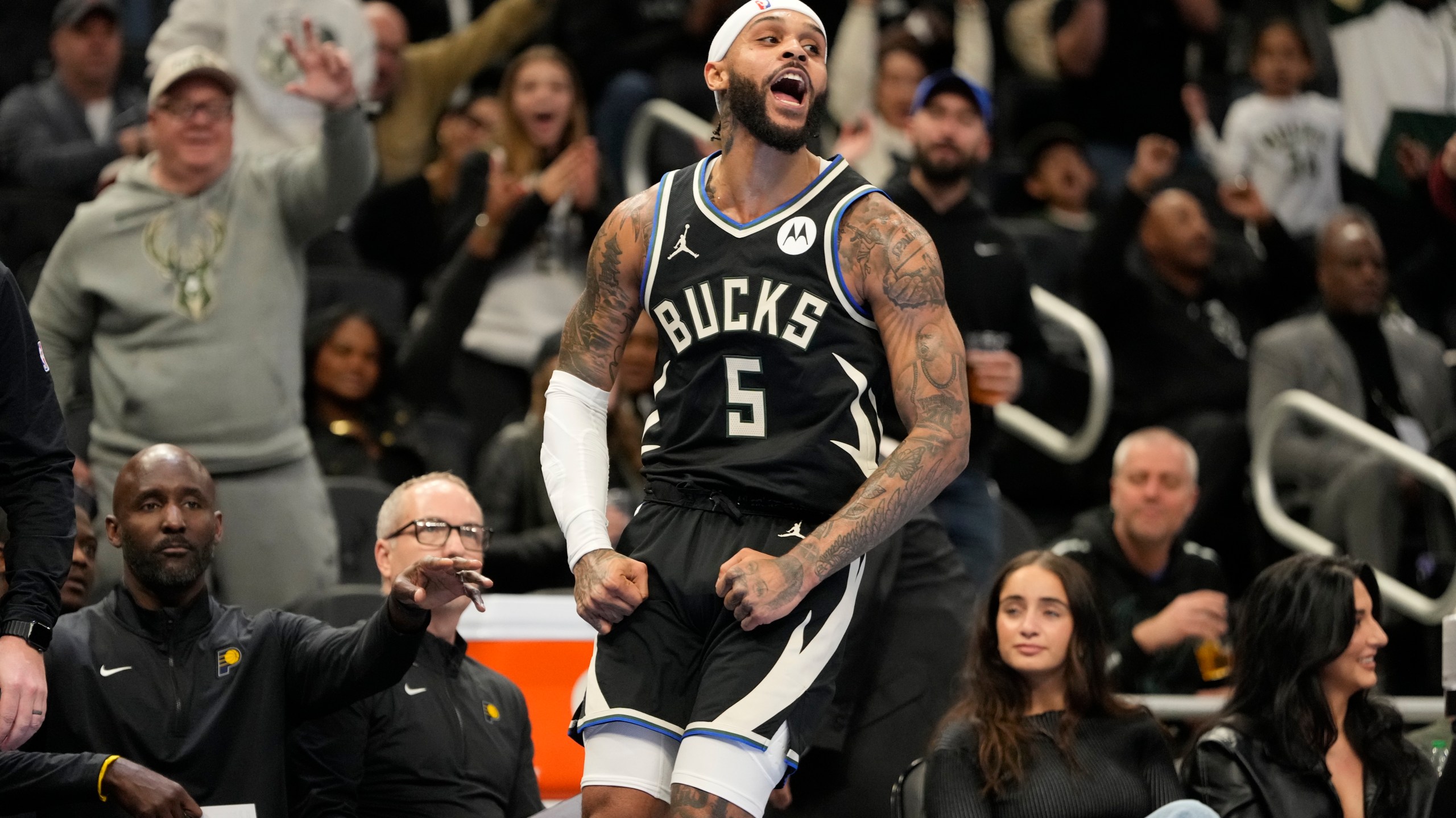 Milwaukee Bucks' Gary Trent Jr. reacts after making a threepointer in the final seconds of the first half of an Emirates NBA cup tournament basketball game against the Indiana Pacers Friday, Nov. 22, 2024, in Milwaukee. (AP Photo/Morry Gash)