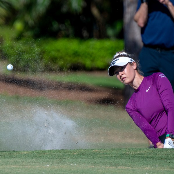 Nelly Korda hits from the sand on the sixth hole during the first round of the LPGA CME Group Tour Championship golf tournament Thursday, Nov. 21, 2024, in Naples, Fla. (AP Photo/Chris Tilley)