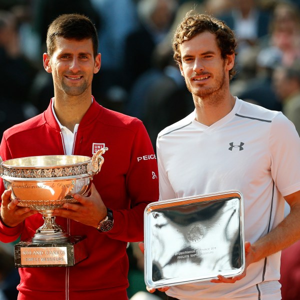 FILE - Serbia's Novak Djokovic, left, and Britain's Andy Murray holds their trophy after their final match of the French Open tennis tournament at the Roland Garros stadium, Sunday, June 5, 2016 in Paris. (AP Photo/Alastair Grant, File)