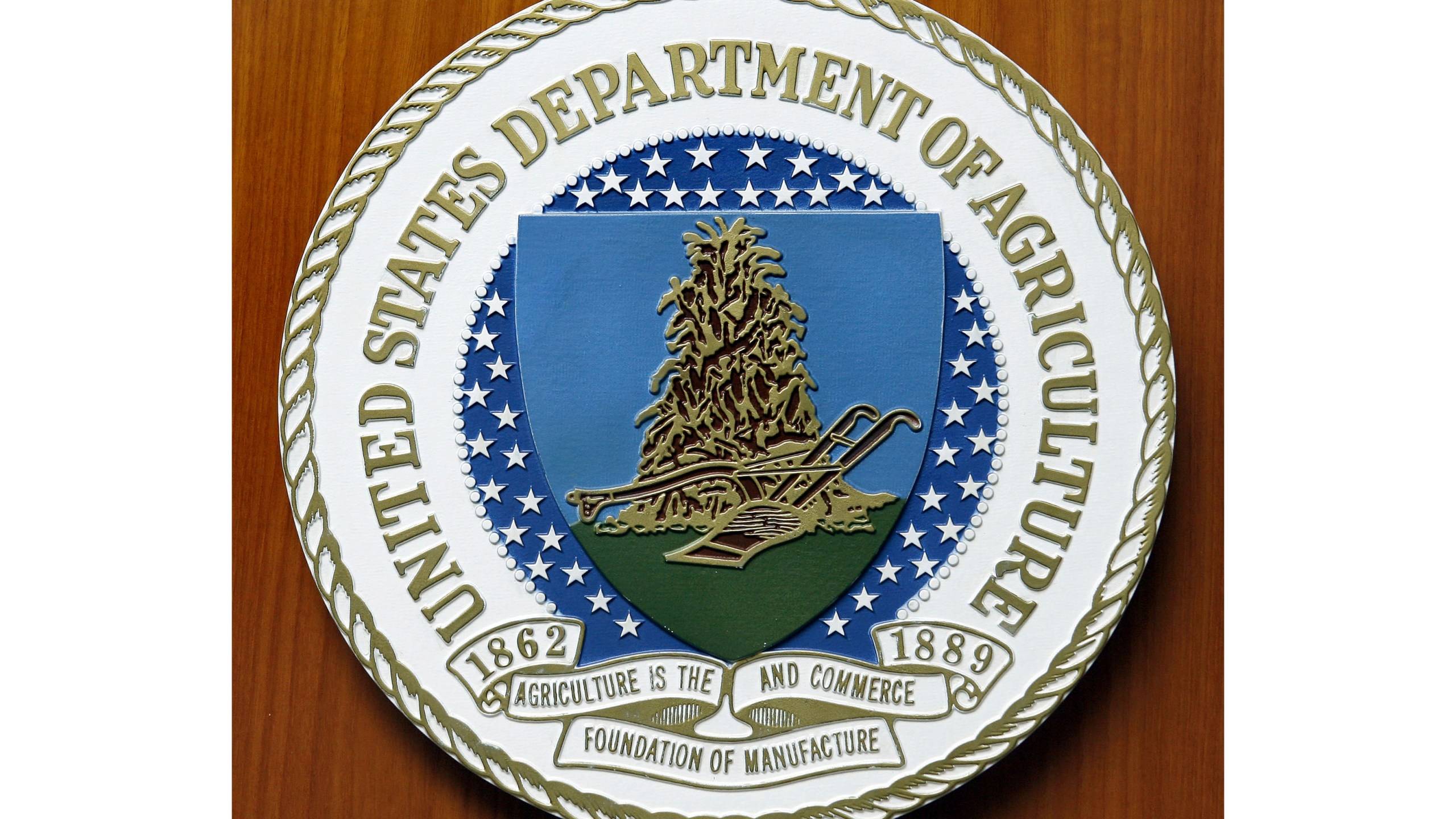 FILE - The logo of the United States Department of Agriculture is seen, Aug. 10, 2007, at the US Embassy in Berlin. (AP Photo/Michael Sohn, File)