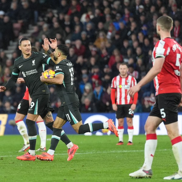 Liverpool's Mohamed Salah, right, celebrates with Darwin Nunez after scoring during the English Premier League soccer match between Southampton and Liverpool in Southampton, England, Sunday, Nov. 24, 2024. (AP Photo/Sean Ryan)