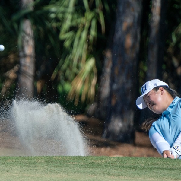 Angel Yin hits from the sand on the sixth hole during the final round of the LPGA CME Group Tour Championship golf tournament Sunday, Nov. 24, 2024, in Naples, Fla. (AP Photo/Chris Tilley)