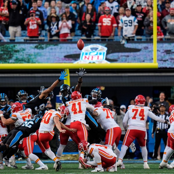 Kansas City Chiefs place kicker Spencer Shrader (40) kicks the game-winning field goal in overtime during an NFL football game against the Carolina Panthers, Sunday, Nov. 24, 2024, in Charlotte, N.C. (AP Photo/Rusty Jones)