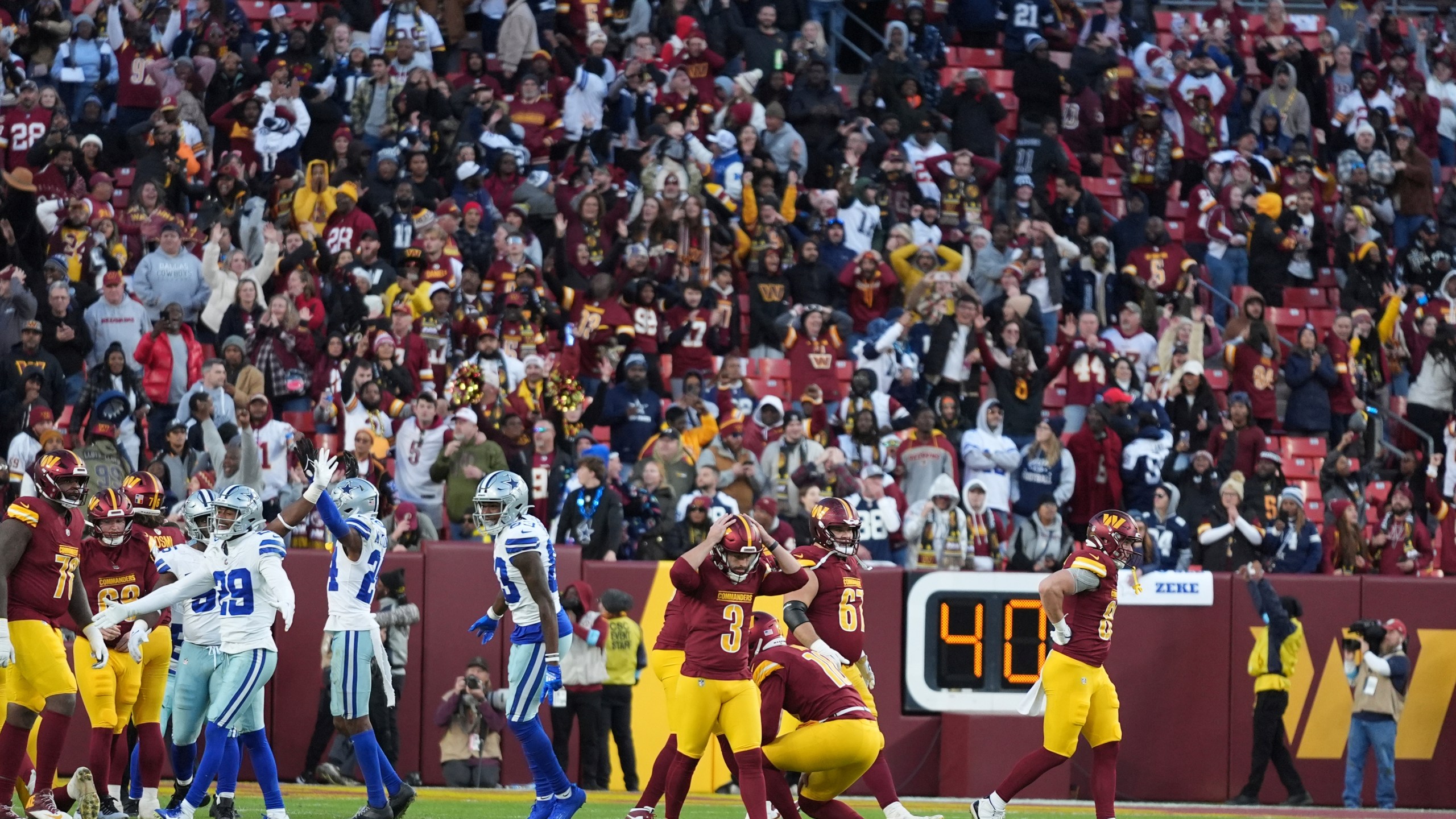 Washington Commanders place kicker Austin Seibert (3) reacts after an unsuccessful point after attempt during the second half of an NFL football game against the Dallas Cowboys, Sunday, Nov. 24, 2024, in Landover, Md. (AP Photo/Stephanie Scarbrough)