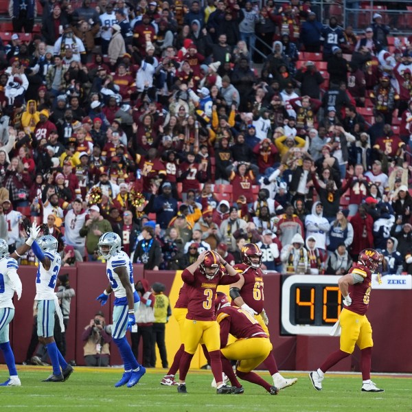 Washington Commanders place kicker Austin Seibert (3) reacts after an unsuccessful point after attempt during the second half of an NFL football game against the Dallas Cowboys, Sunday, Nov. 24, 2024, in Landover, Md. (AP Photo/Stephanie Scarbrough)