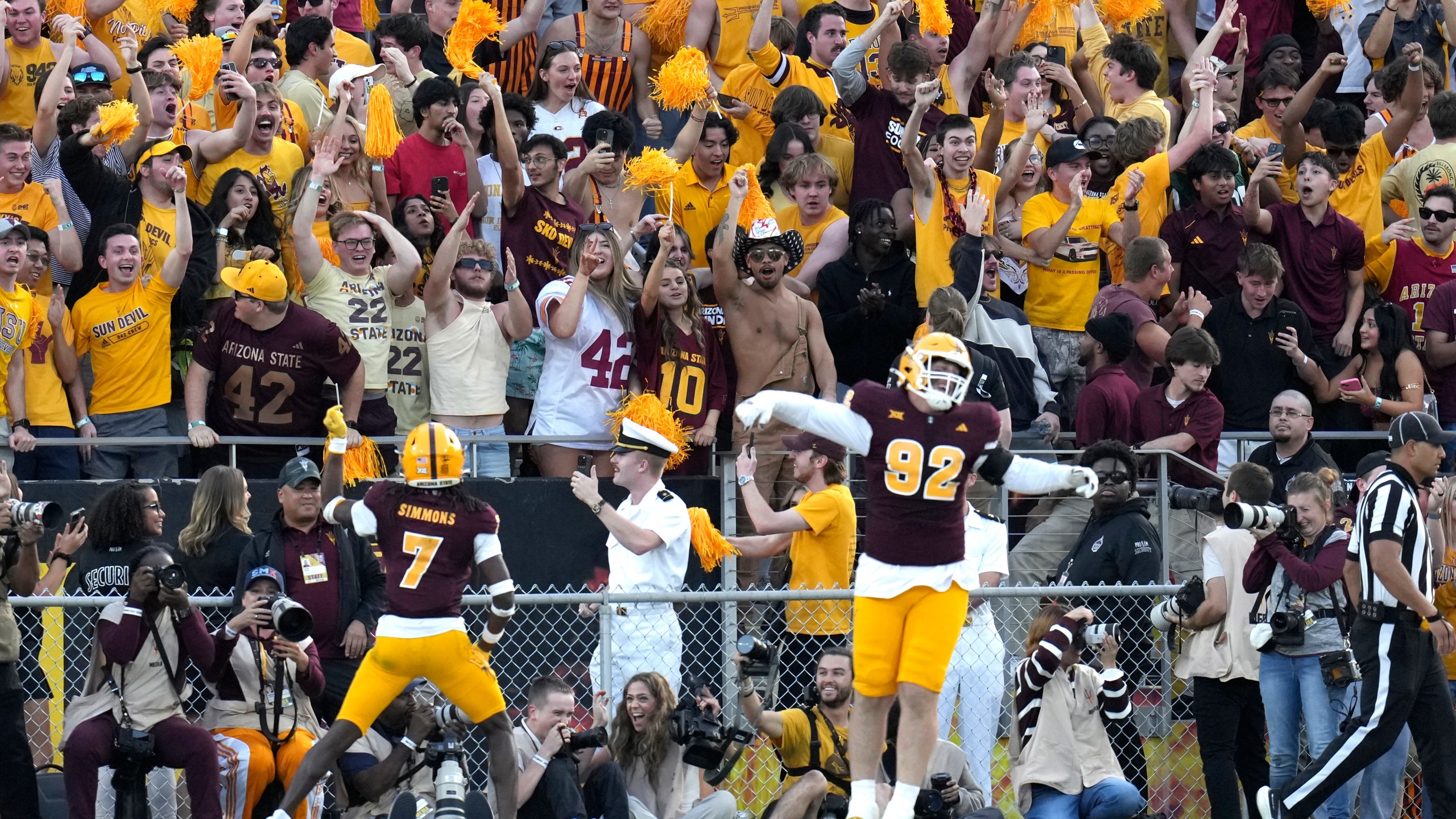 Arizona State defensive back Shamari Simmons (7) and defensive lineman Zac Swanson (92) celebrate an interception against BYU during the second half of an NCAA college football game Saturday, Nov. 23, 2024, in Tempe, Ariz. Arizona State won 28-23. (AP Photo/Ross D. Franklin)