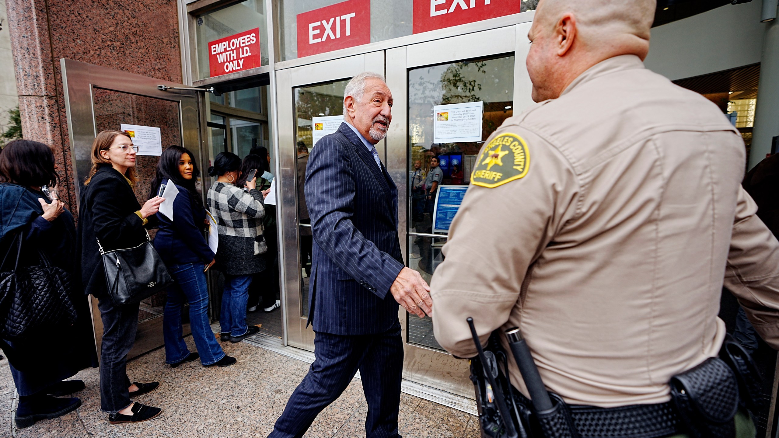 Defense Attorney Mark Geragos, arrives at the Van Nuys courthouse in Los Angeles, for a hearing for Erik and Lyle Menendez, on Monday, Nov. 25, 2024. (AP Photo/Damian Dovarganes)