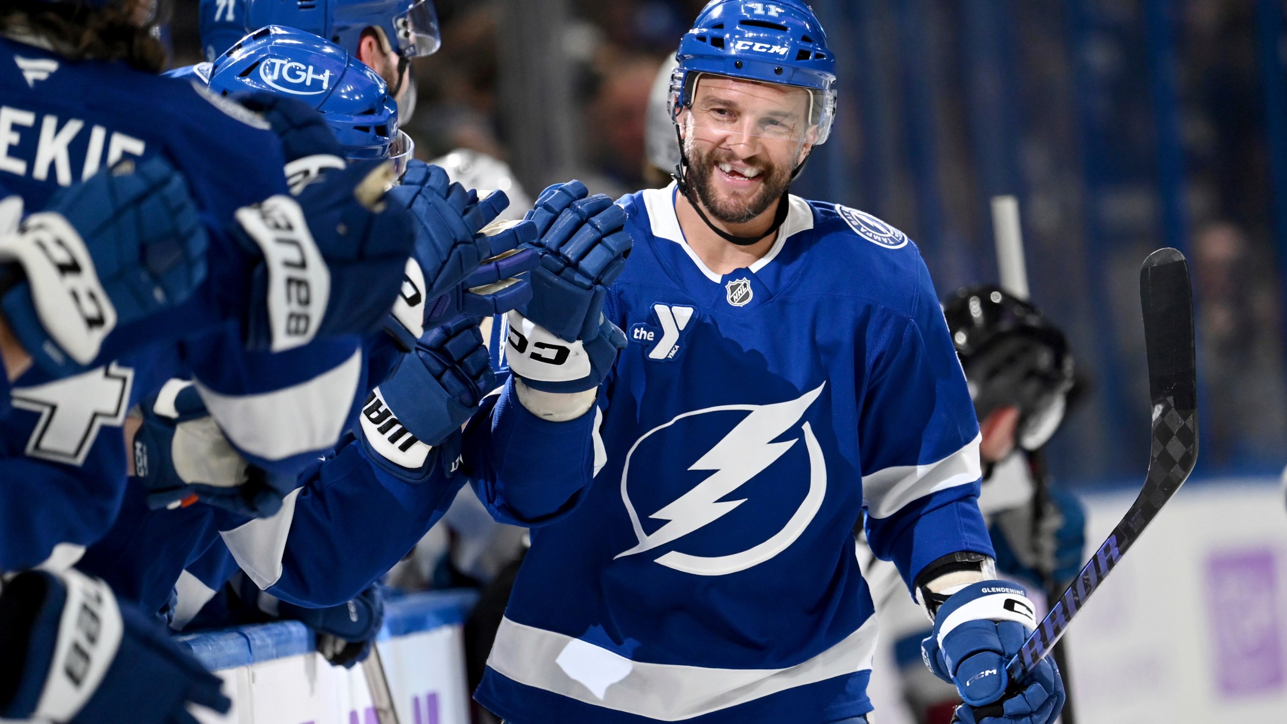 Tampa Bay Lightning center Luke Glendening (11) celebrates after his short-handed goal during the first period of an NHL hockey game against the Colorado Avalanche, Monday, Nov. 25, 2024, in Tampa, Fla. (AP Photo/Jason Behnken)