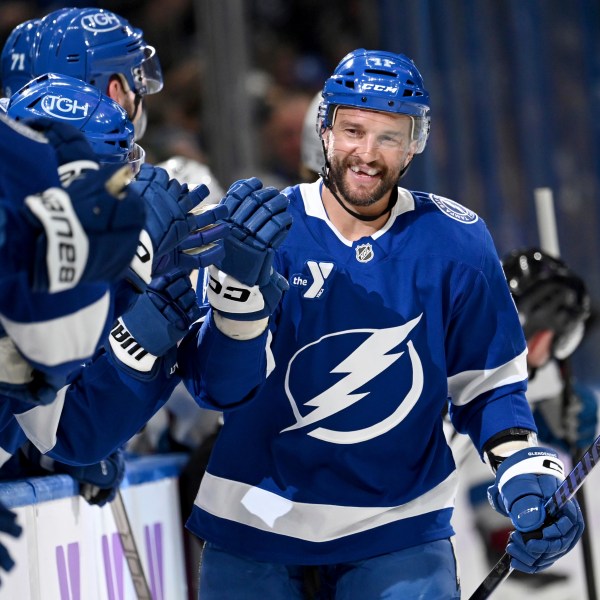 Tampa Bay Lightning center Luke Glendening (11) celebrates after his short-handed goal during the first period of an NHL hockey game against the Colorado Avalanche, Monday, Nov. 25, 2024, in Tampa, Fla. (AP Photo/Jason Behnken)