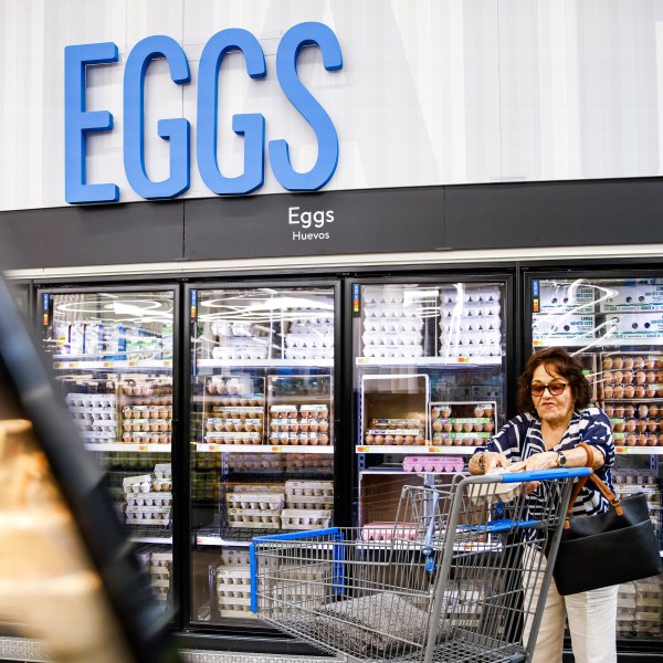 FILE - A woman buys eggs at a Walmart Superstore in Secaucus, New Jersey, on July 11, 2024. (AP Photo/Eduardo Munoz Alvarez)