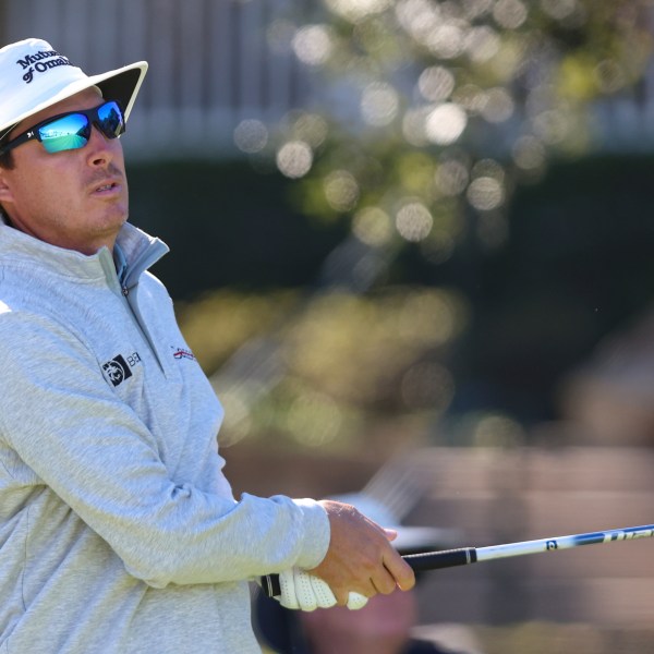 Joel Dahmen watches his drive from the 10th tee during the final final round of the RSM Classic golf tournament, Sunday, Nov. 24, 2024, in St. Simons Island, Ga. (AP Photo/Gary McCullough)