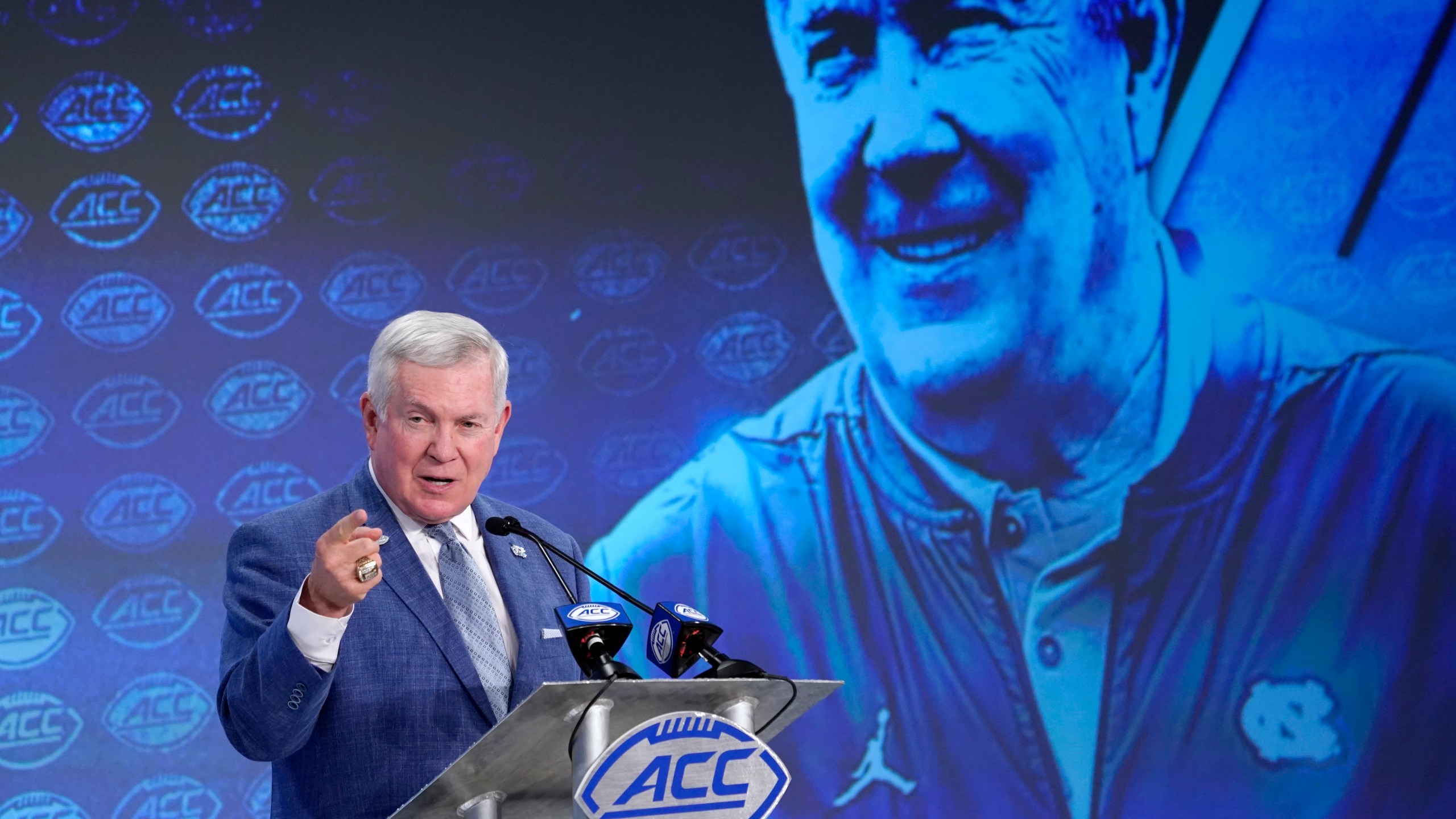 FILE - North Carolina head coach Mack Brown speaks during the Atlantic Coast Conference NCAA college football media days in Charlotte, N.C., Thursday, July 18, 2019. (AP Photo/Chuck Burton, File)