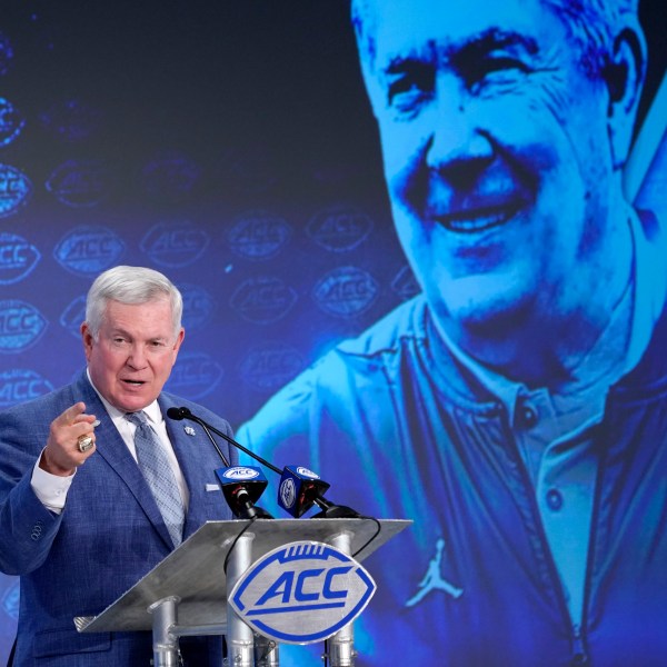 FILE - North Carolina head coach Mack Brown speaks during the Atlantic Coast Conference NCAA college football media days in Charlotte, N.C., Thursday, July 18, 2019. (AP Photo/Chuck Burton, File)