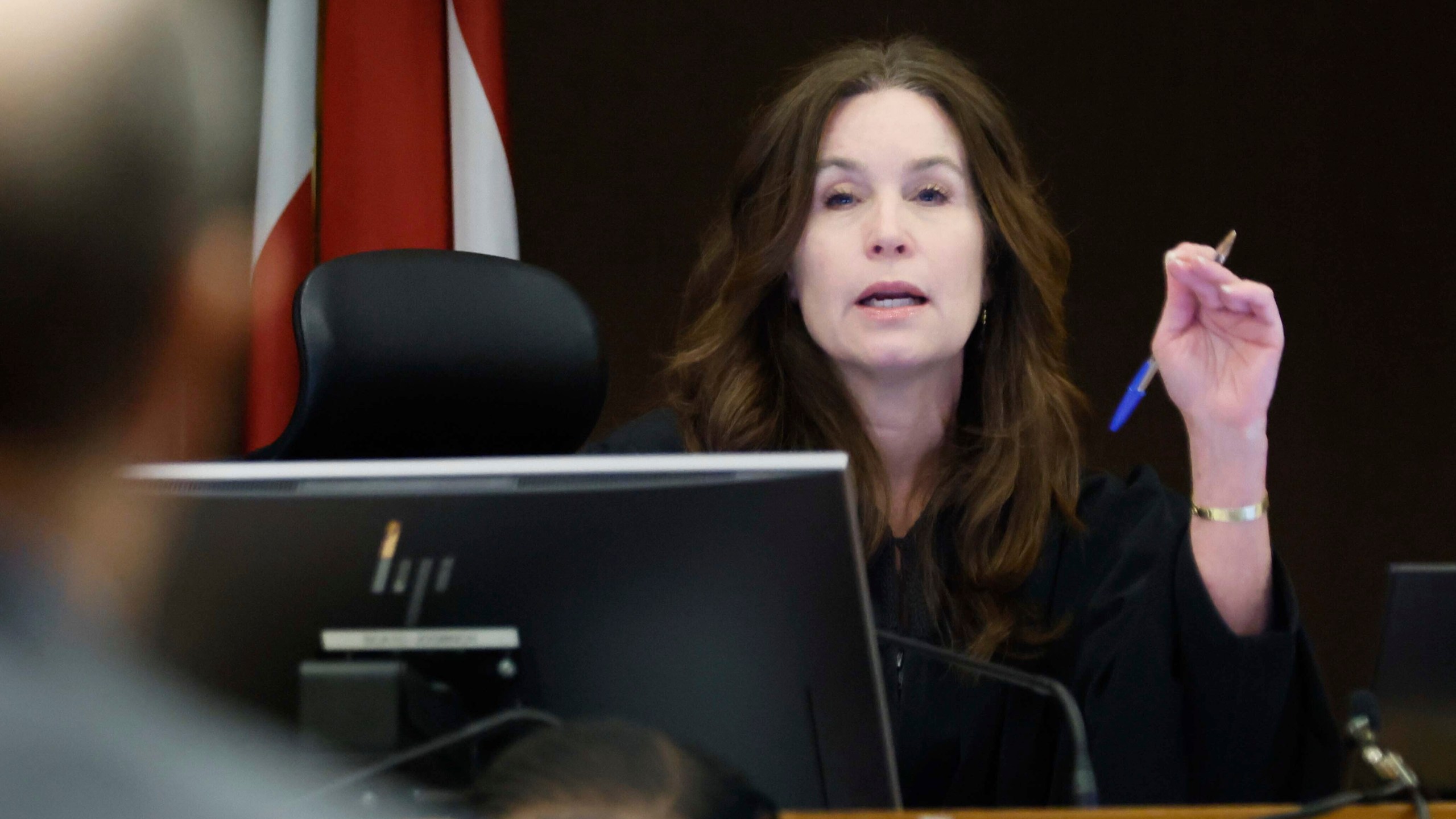 Fulton County Superior Court Judge Paige Reese Whitaker speaks with a prosecutor during the Young Thug trial at Fulton County Courthouse in Atlanta on Tuesday, Nov. 26, 2024. (Miguel Martinez/Atlanta Journal-Constitution via AP)