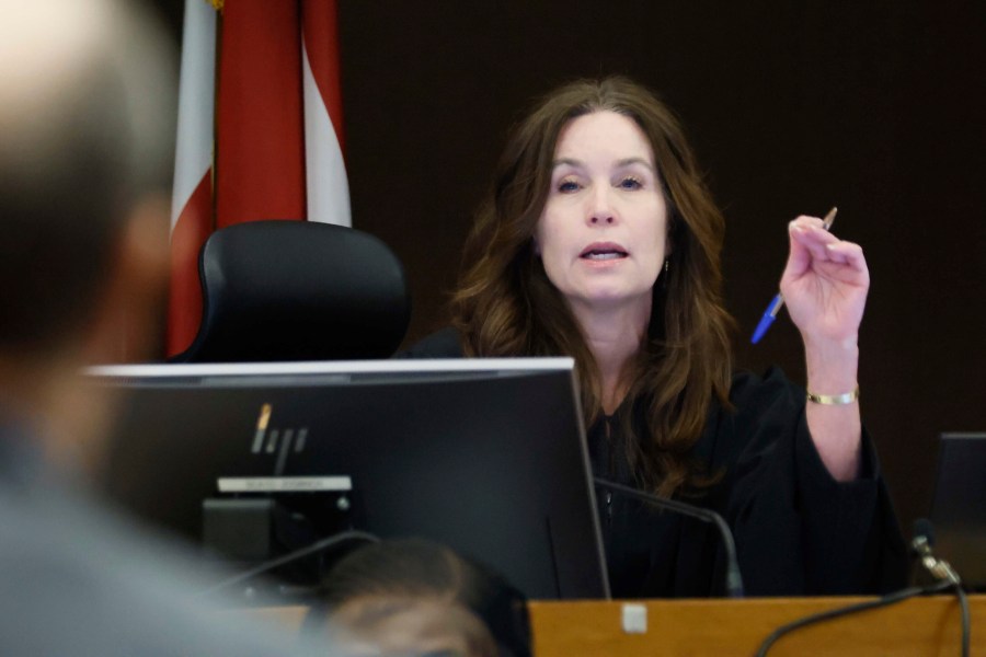 Fulton County Superior Court Judge Paige Reese Whitaker speaks with a prosecutor during the Young Thug trial at Fulton County Courthouse in Atlanta on Tuesday, Nov. 26, 2024. (Miguel Martinez/Atlanta Journal-Constitution via AP)