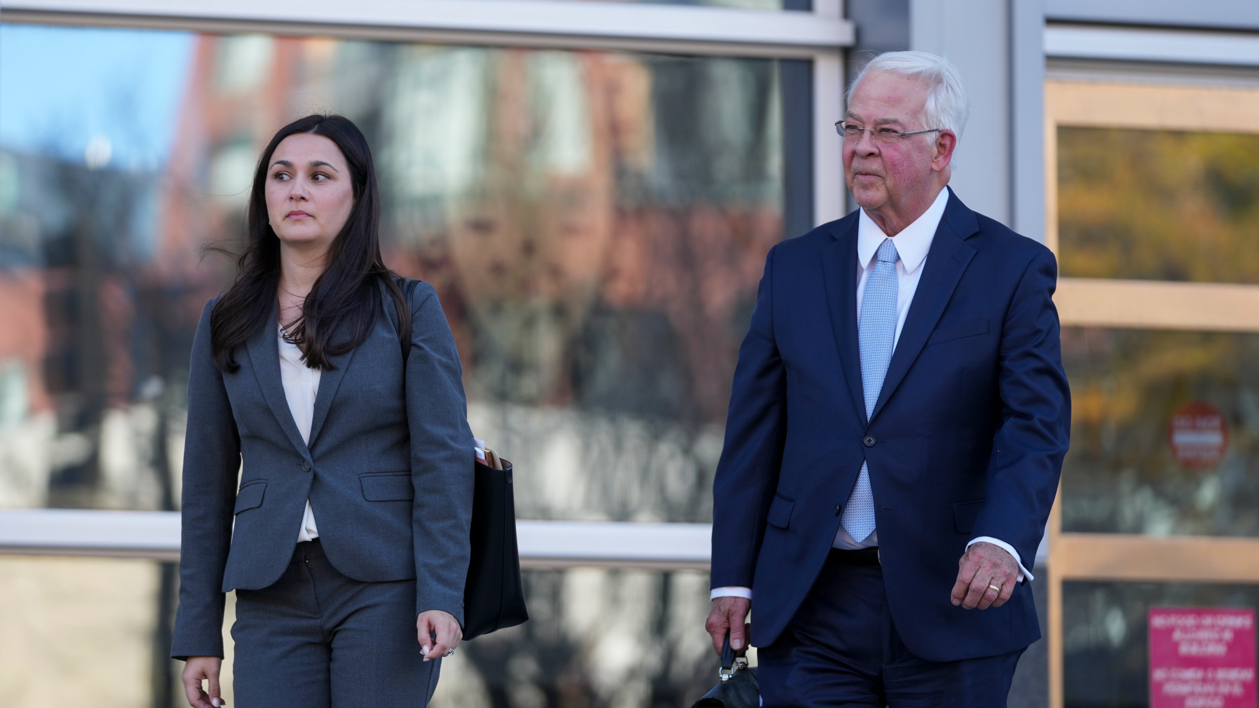 Megan Coleman and Robert Bonsib, attorneys representing Eduardo Valdivia, an FBI agent accused of sexually assaulting two women, leave the Montgomery County District Court in Rockville, Md., following a bond hearing for Valdivia, Tuesday, Nov. 26, 2024. (AP Photo/Stephanie Scarbrough)